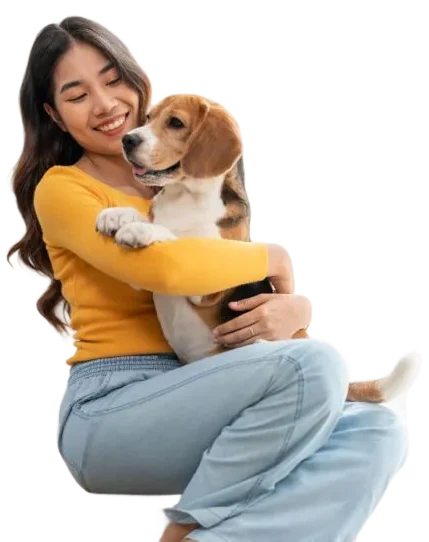 愛犬を抱く飼い主
